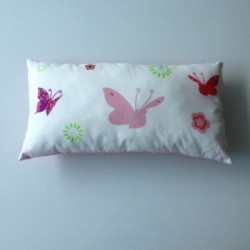 Coussin papillons multicolores